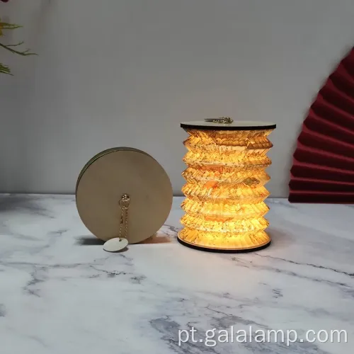 Luz noturna elegante com design de livros dobráveis